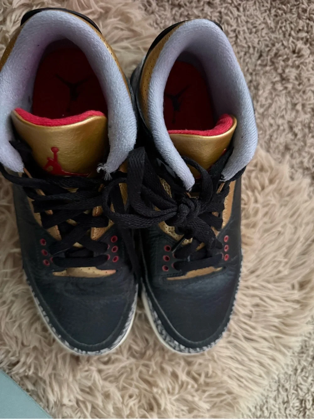 Jordan Men's Black and Gold Low-Top Sneakers with Red Accents